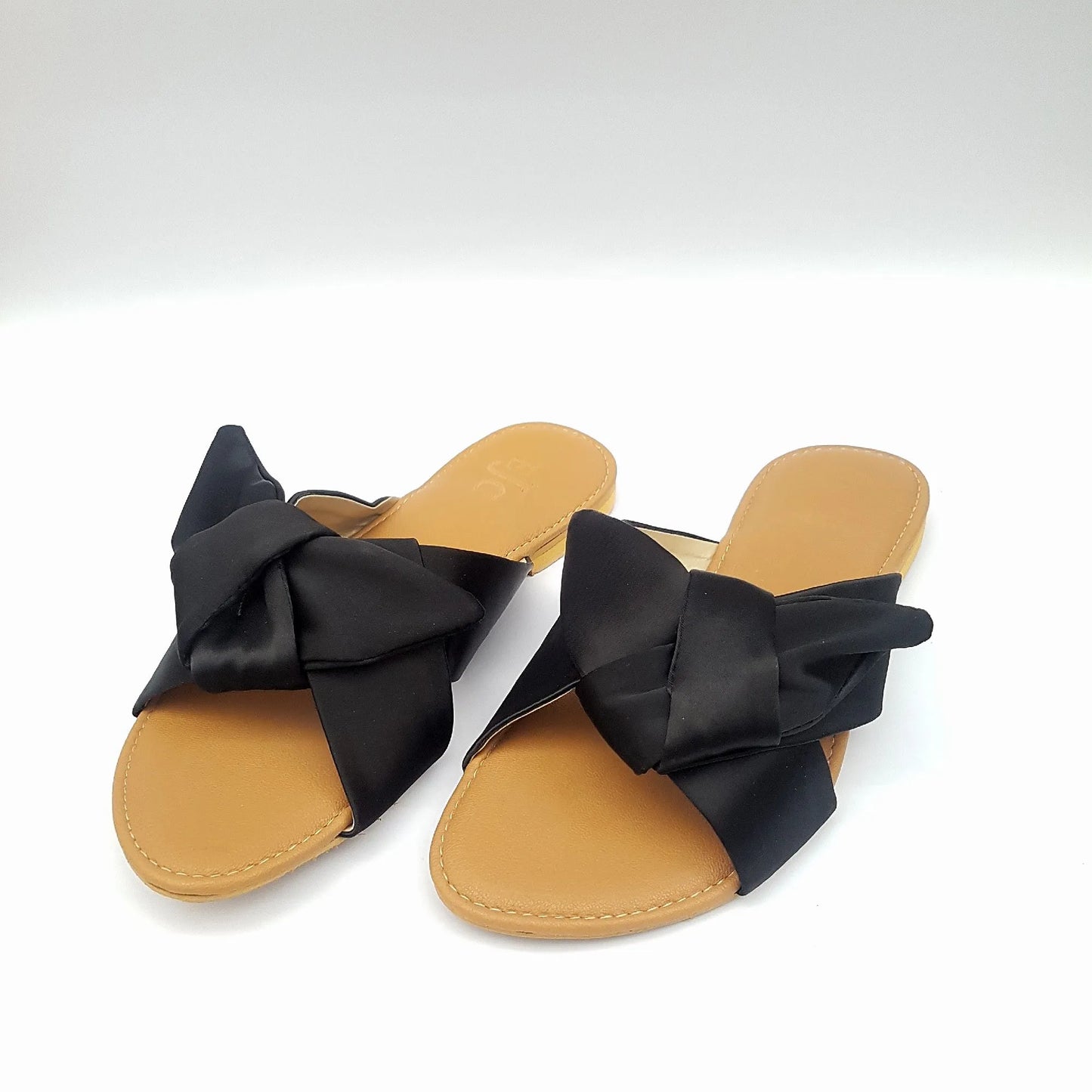 Slip on Sandals with black velvet bow and tan Sole