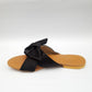 Slip on Sandals with black velvet bow and tan Sole