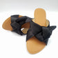 Slip on Sandals with black velvet bow and tan Sole