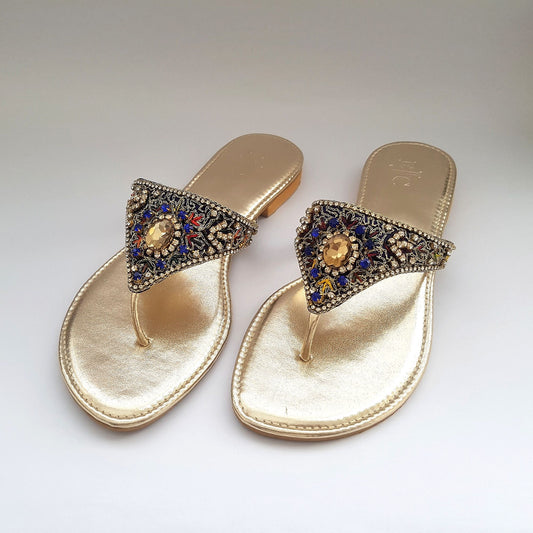 Golden flat slippers with multi-colour stone embellishment