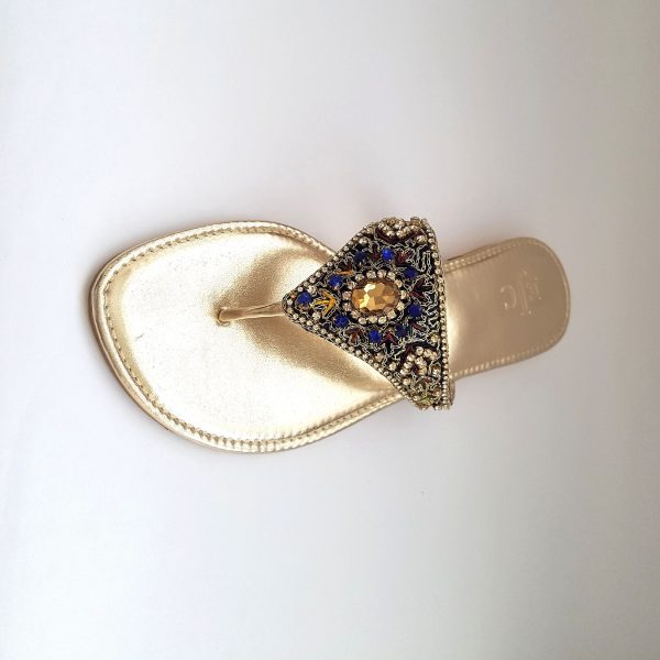 Golden flat slippers with multi-colour stone embellishment