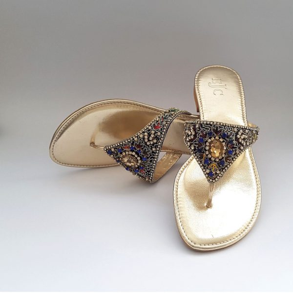 Golden flat slippers with multi-colour stone embellishment