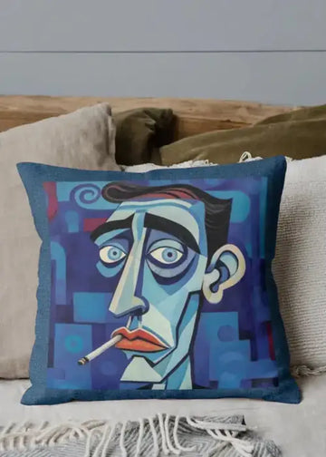 Decorative pillow with a stylized face design on a couch