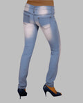 Light blue jeans worn by a person on a gray background