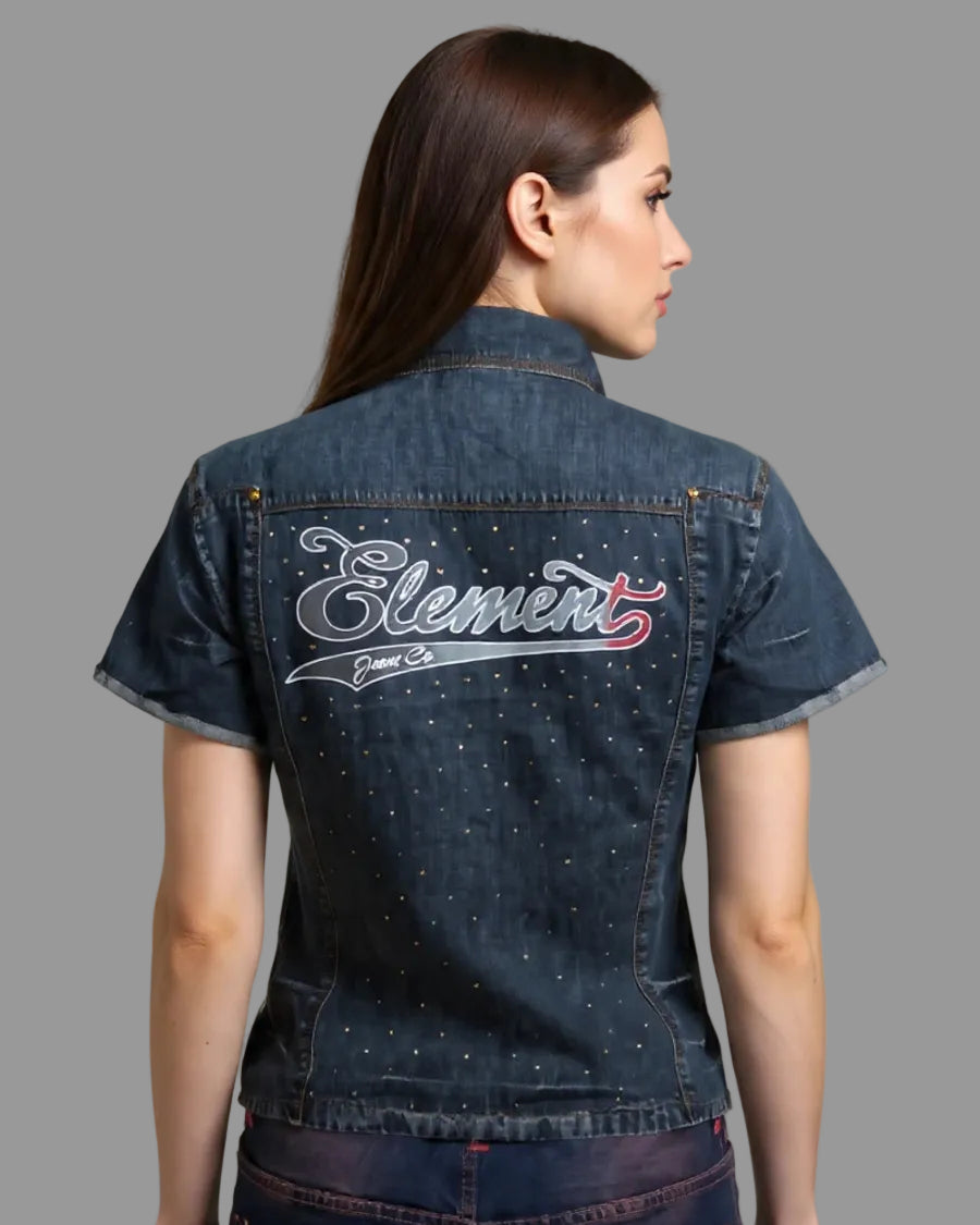 Woman wearing a denim jacket with 'Element' branding on a plain background
