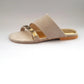 Beige sandal with a gold strap on a white background