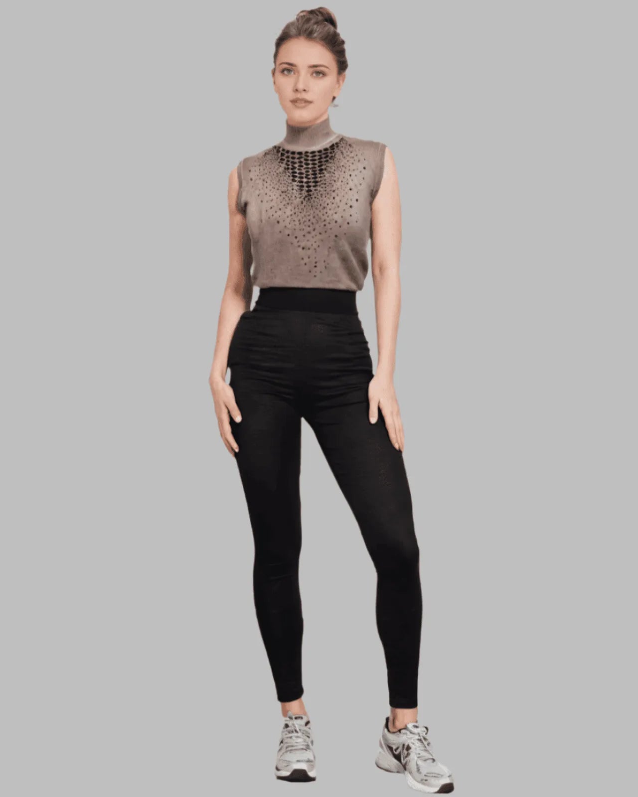 Beige sleeveless turtle neck sweater with embellishment