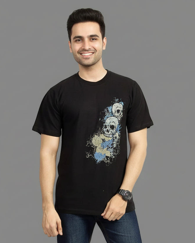 Person wearing a black t-shirt with a graphic design on a gray background