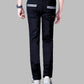 Person wearing black pants with white stripes on a gray background