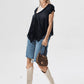 Black diagonal cut sweater knit top