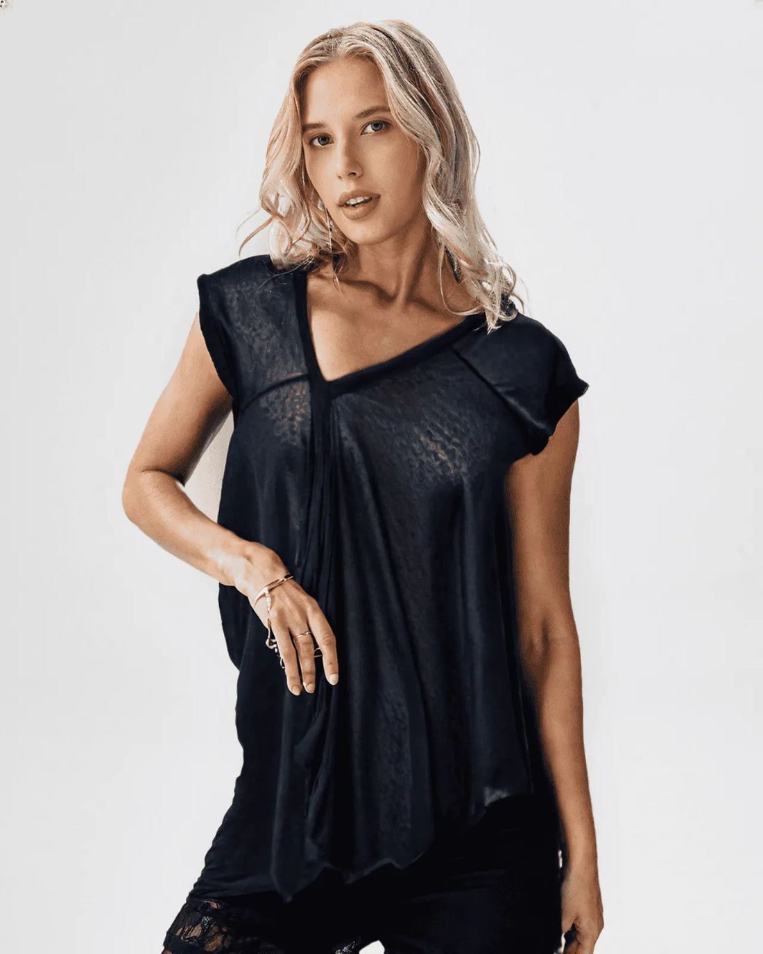 Black diagonal cut sweater knit top