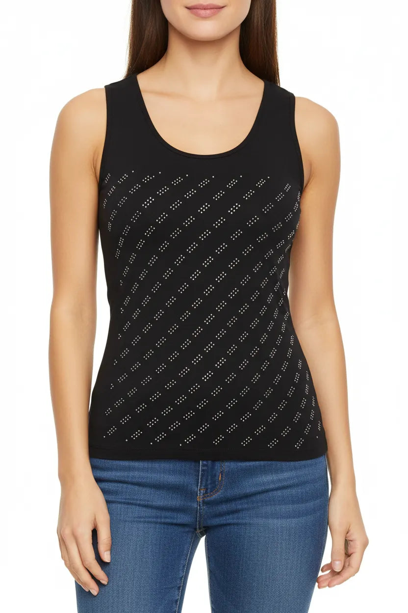 Person wearing a black outfit with geometric pattern on a white background