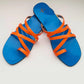 Blue sandals with orange straps on a white background