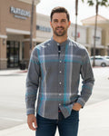 A men's long-sleeve button-up shirt with a gray, blue, and white plaid pattern