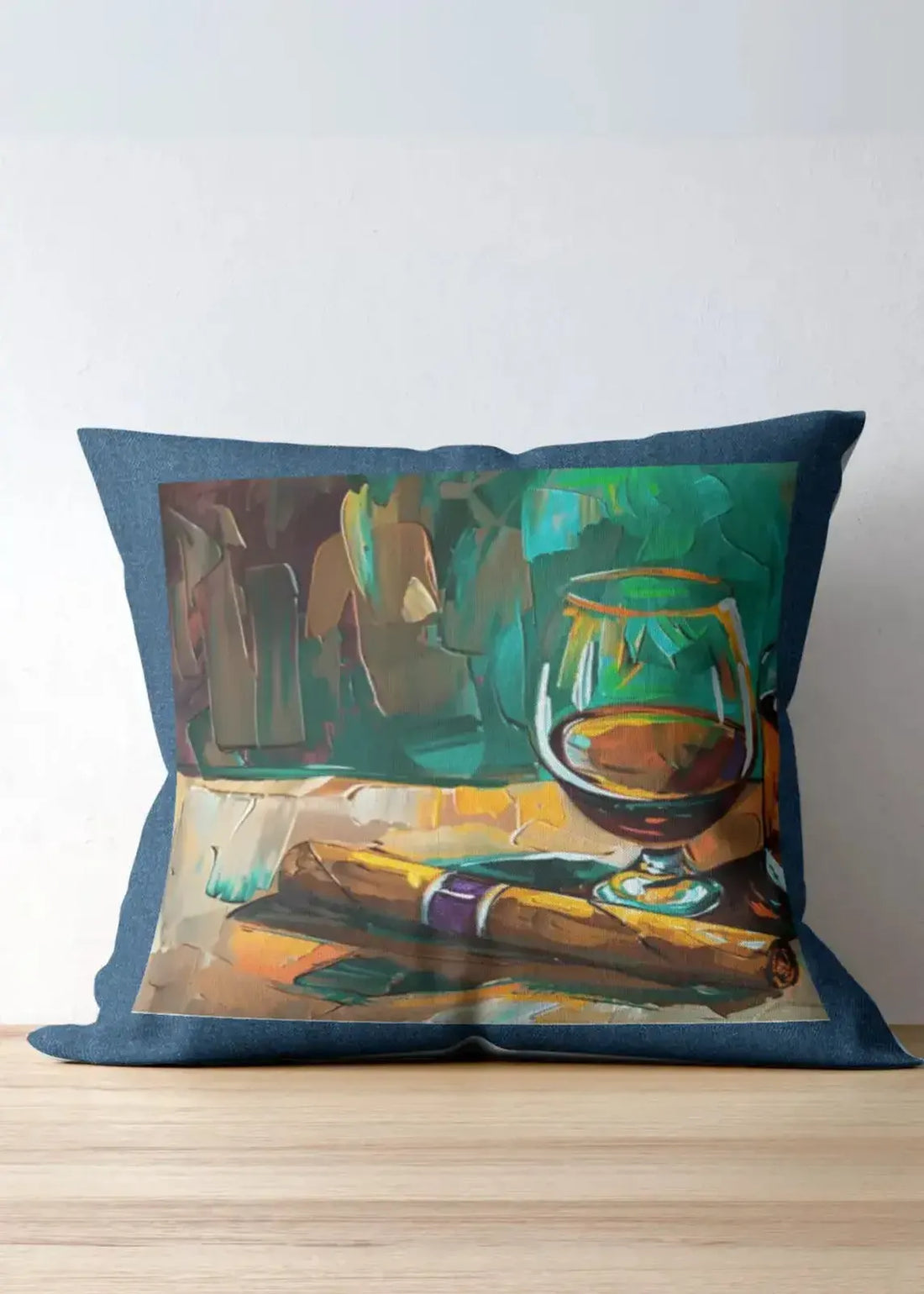 Decorative pillow with a painting of a glass of red wine on a couch.