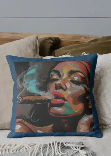 Decorative pillow with a colorful face design on a couch.