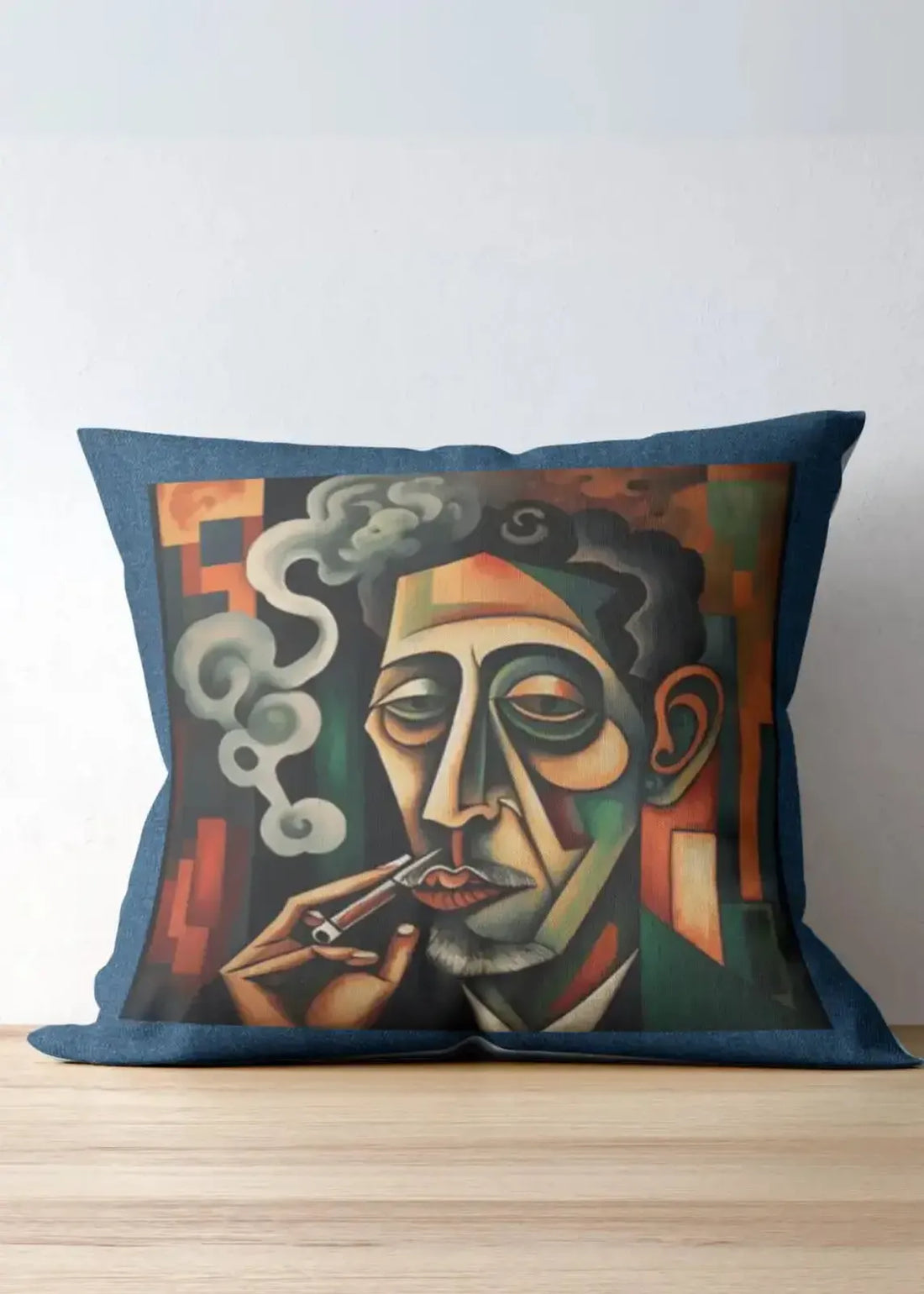 Decorative pillow with a stylized portrait of a man smoking on a couch.