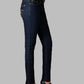 Dark blue jeans worn by a person on a gray background