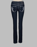 Black jeans with white embroidery on a gray background