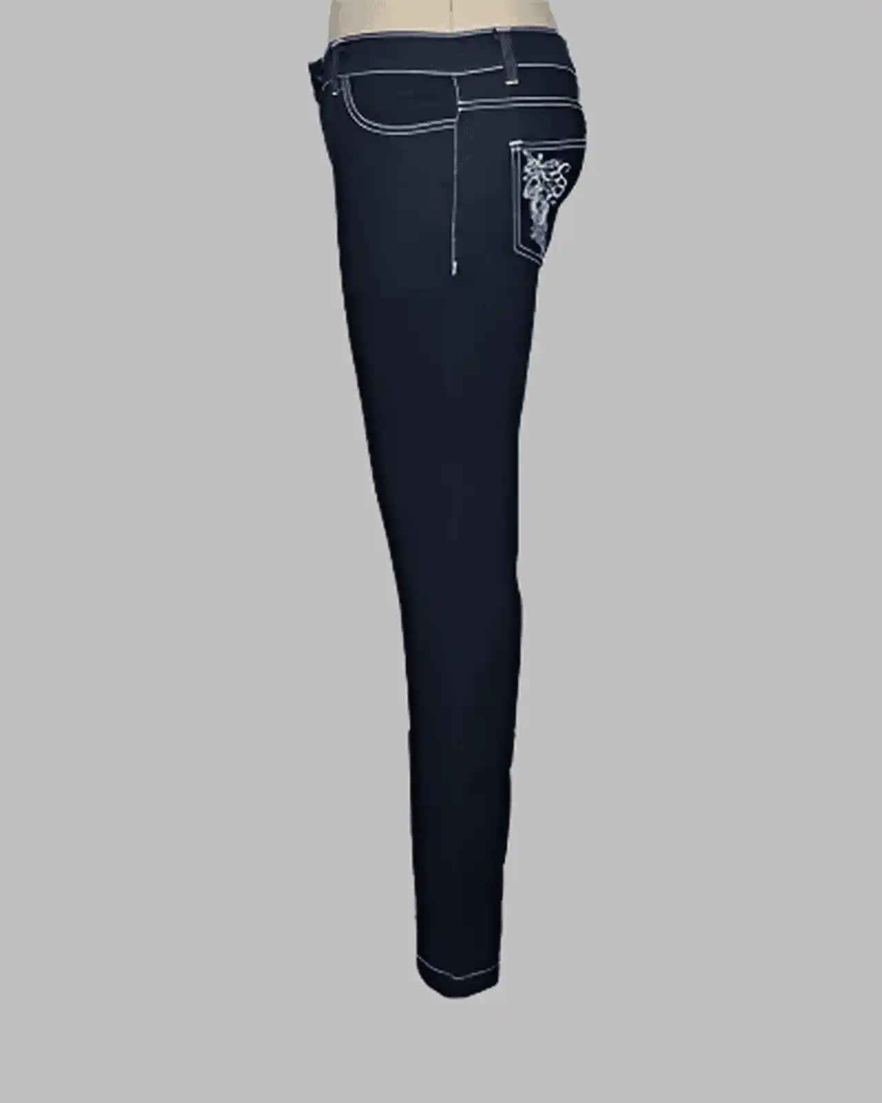 Dark Blue mid rise skinny jeans with white stitching. crystal button and rivet, embroidery with hot fix crystals on back pocket  