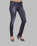 Dark blue jeans worn by a person on a gray background