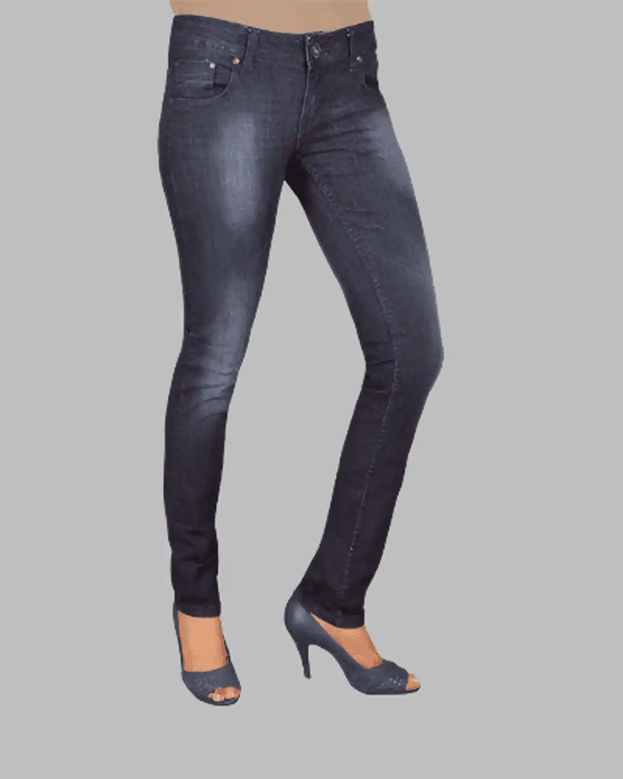 Dark blue jeans worn by a person on a gray background