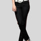 Person wearing black pants with a white belt on a gray background