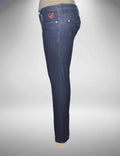 Blue jeans on a mannequin with a gray background