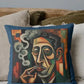 Decorative pillow with a stylized portrait of a man smoking on a couch.