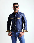 Man wearing a denim shirt and jeans on a white background