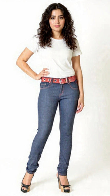 Woman wearing blue jeans with a red belt on a white background