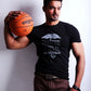 Man holding a basketball against a white background