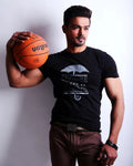 Man holding a basketball against a white background