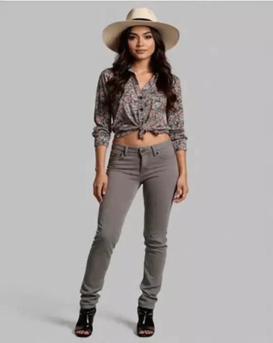 Person wearing gray pants on a plain background