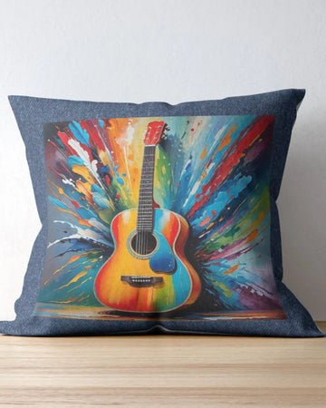 Decorative pillow with a colorful guitar design on a wooden surface.