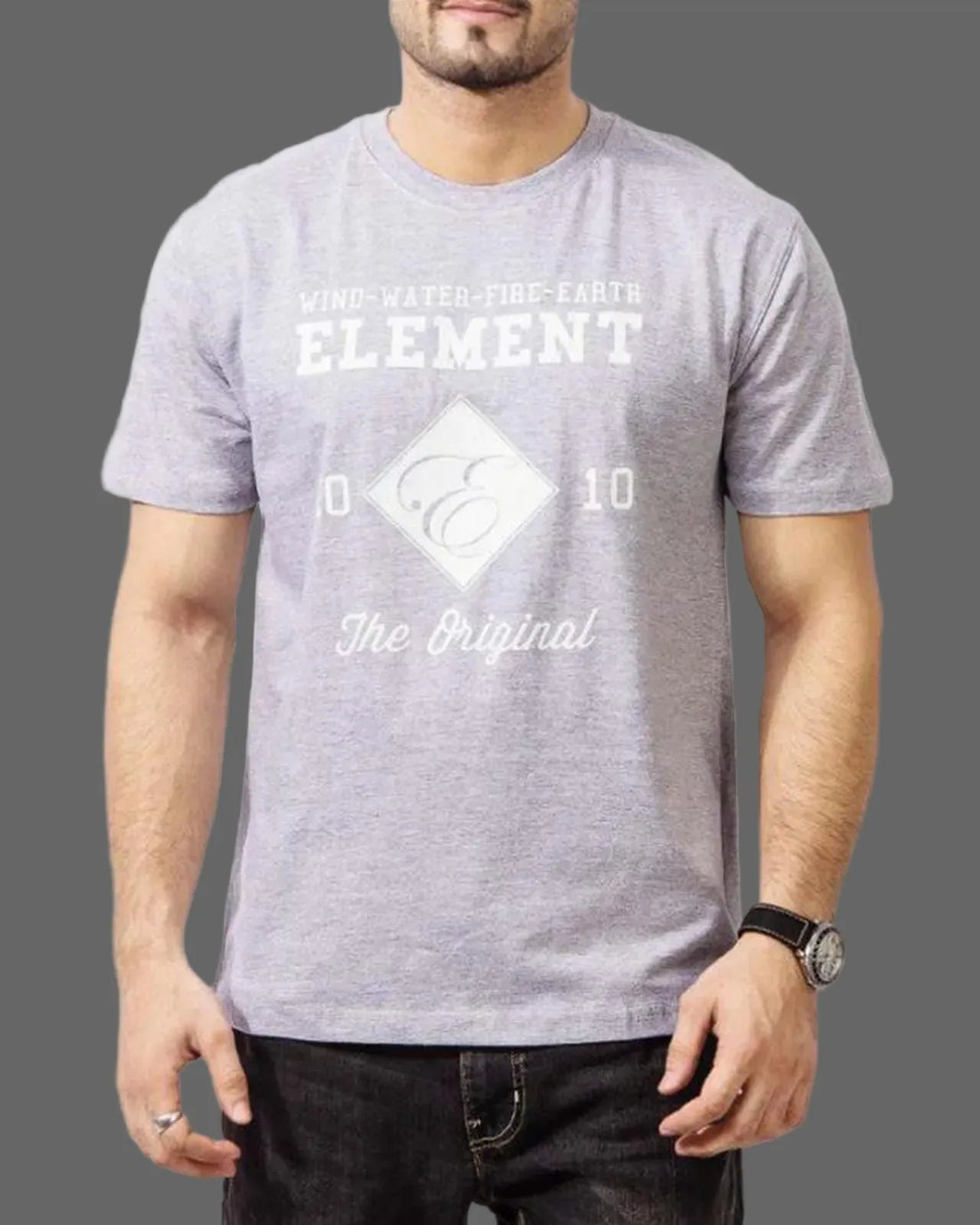 Person wearing a gray t-shirt with white text and logo on a plain background