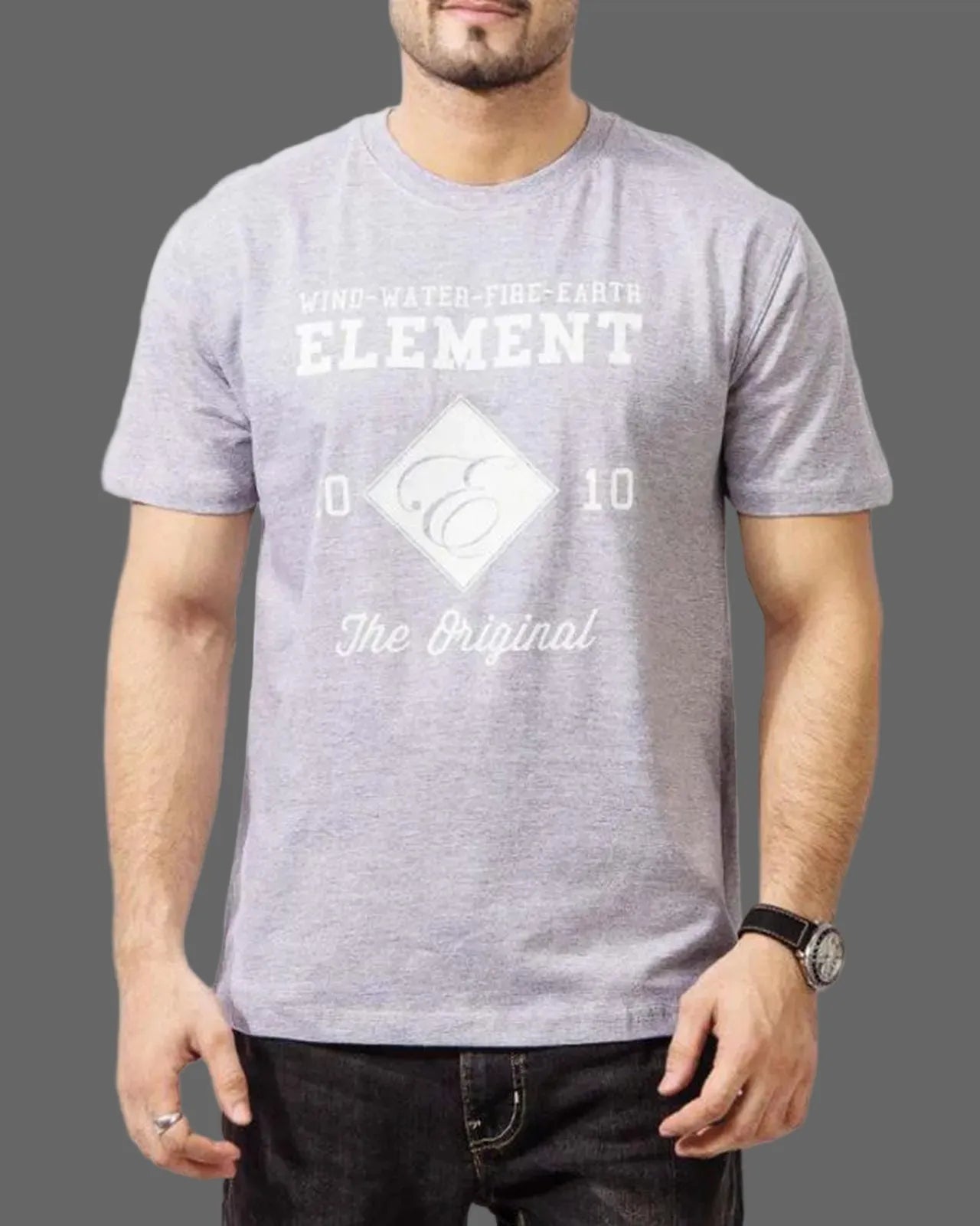 Person wearing a gray t-shirt with white text and logo on a plain background