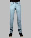 Light blue jeans on a gray background