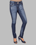 Blue jeans worn by a person on a gray background