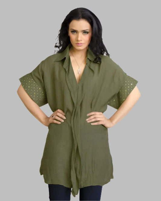 Loose fit short sleeve linen shirt with ruffle front.