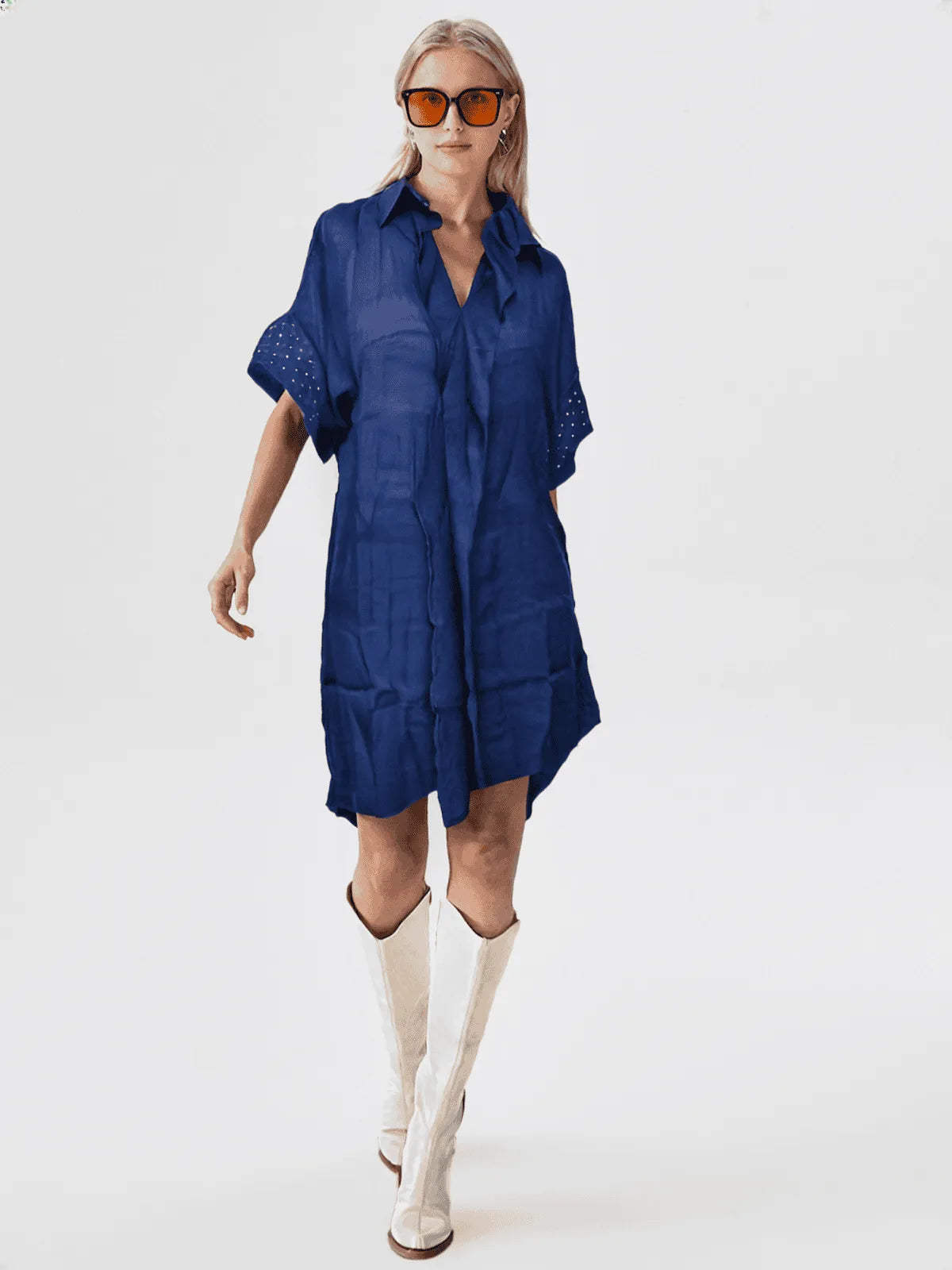 Loose fit short sleeve linen shirt with ruffle front.