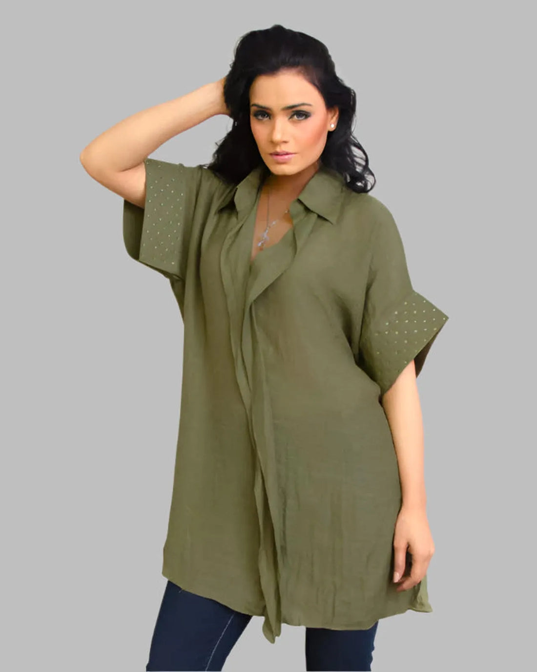 Loose fit short sleeve linen shirt with ruffle front.