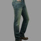 Blue jeans worn by a person on a gray background