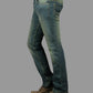 Blue jeans worn by a person on a gray background