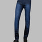 Blue jeans worn by a person on a gray background