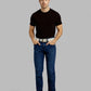 Man wearing a black t-shirt, blue jeans, and white sneakers on a gray background