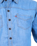 Close-up of a blue denim shirt with buttons and a pocket on a white background