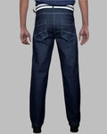 Dark blue jeans on a gray background