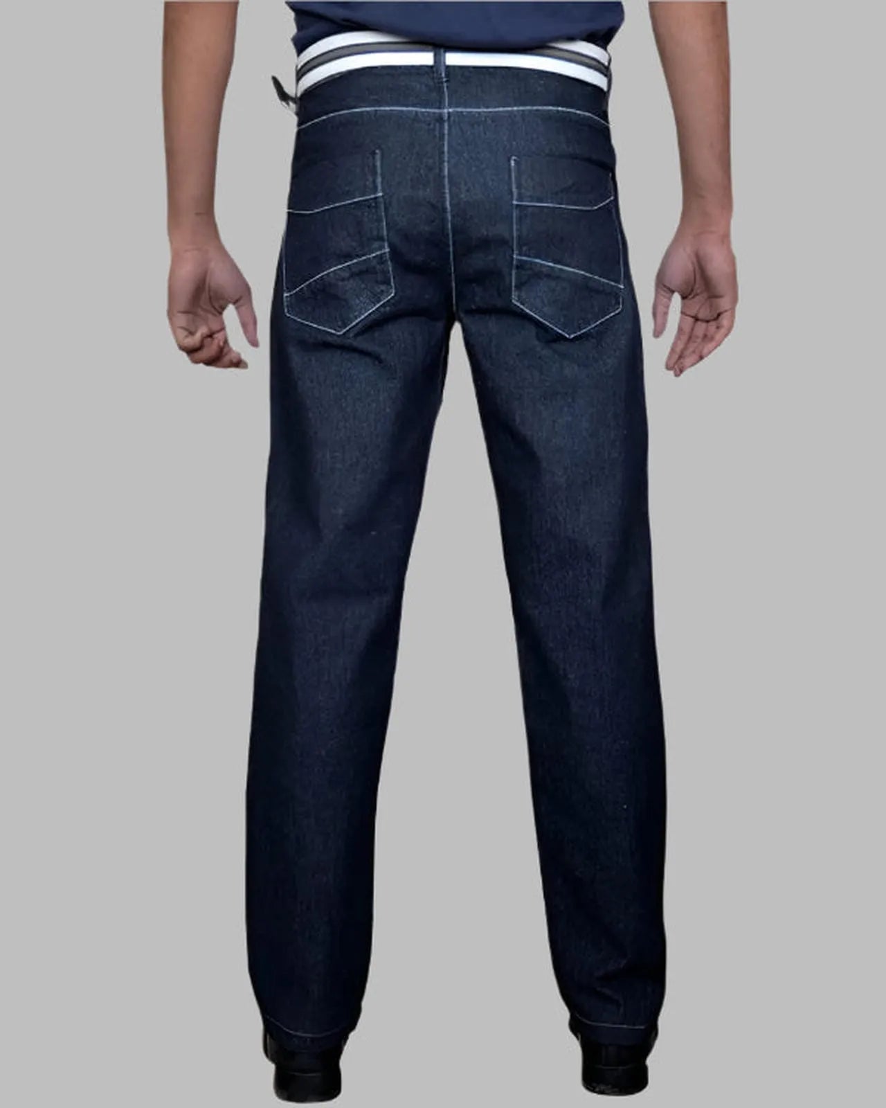 Dark blue jeans on a gray background