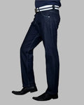 Dark blue jeans worn by a person on a gray background